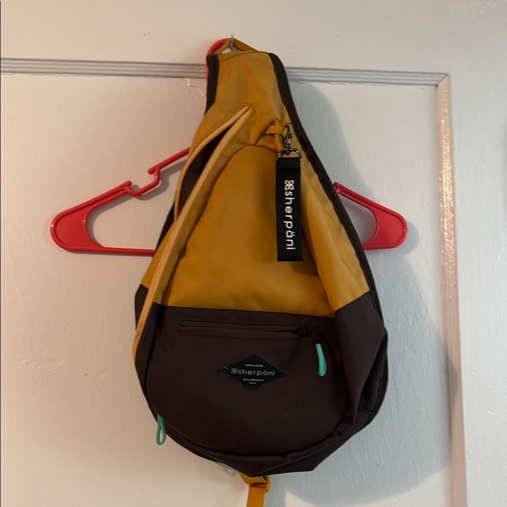 Sherpani Yellow and Brown Backpack with Modern Design